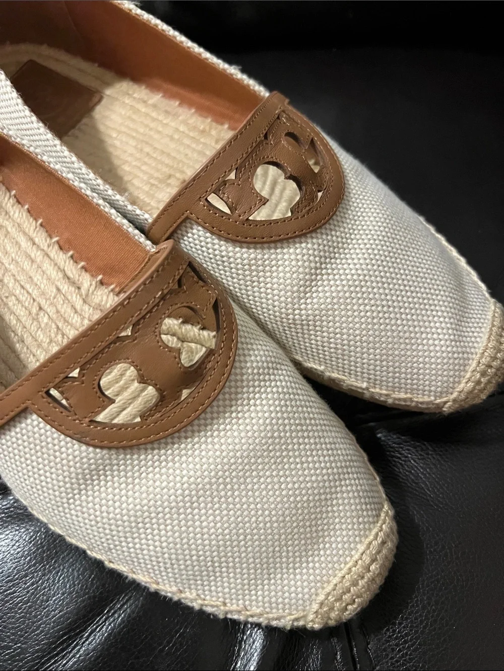 Tory Burch accent many logo